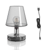 Transparante draadloze tafellamp met zichtbare gloeilamp en zwarte USB-oplaadkab