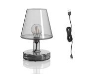 Transparante draadloze tafellamp met zichtbare gloeilamp en zwarte USB-oplaadkab